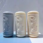 Cream and gray relief pillars with beaded border bands