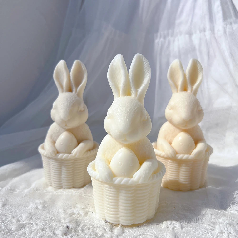 Rabbits seated in woven-look baskets with eggs