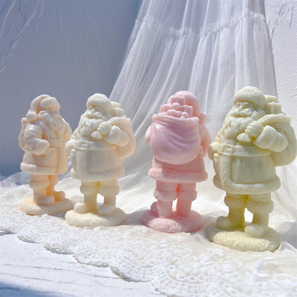 Rear and three-quarter views of Santa figures showing sack and winter outfit