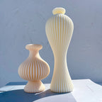 Short rounded and tall slender ribbed vase-shaped castings
