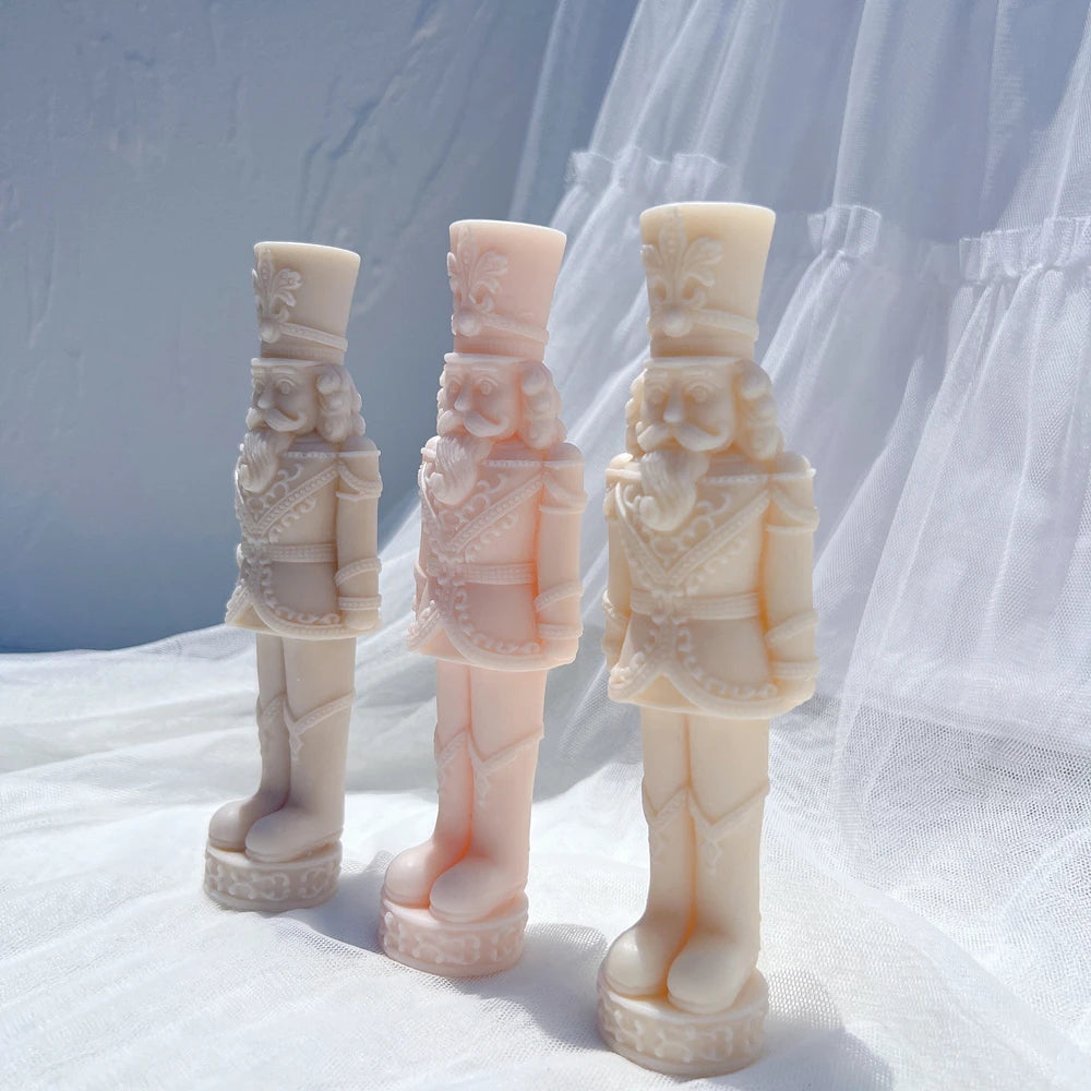Angled full-length nutcracker samples showing patterned uniforms