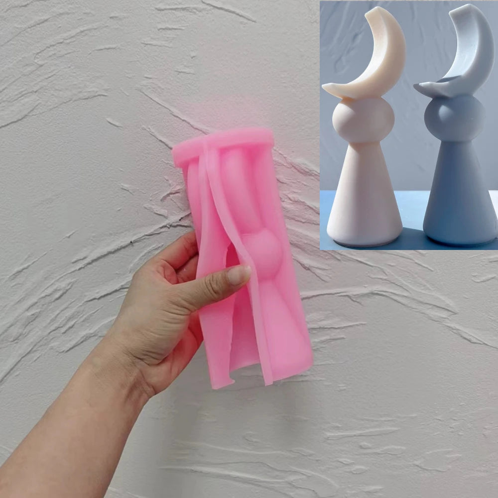Pink silicone One Ball Crescent sculpture mold held open