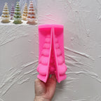 Pink tree silicone mold opened to reveal the layered branch cavity