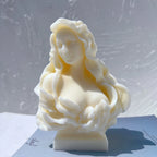 Angled view of layered petals around a woman's bust