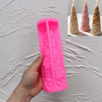 Pink silicone poinsettia flower tree mold held upright