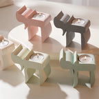 Top views of single-cup Chai tealight holders with inserted candles