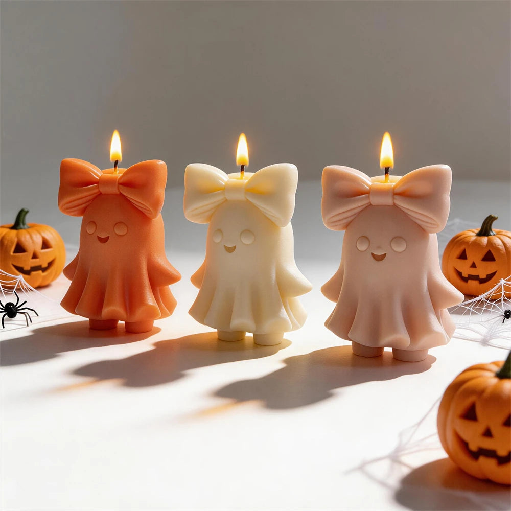 Orange, cream and peach ghost candle castings with oversized bows