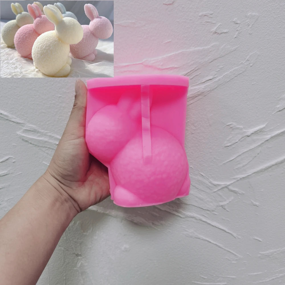 Pink crouching rabbit silicone mold with matching examples