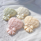 Rose bouquet castings tied with sculpted ribbon bows