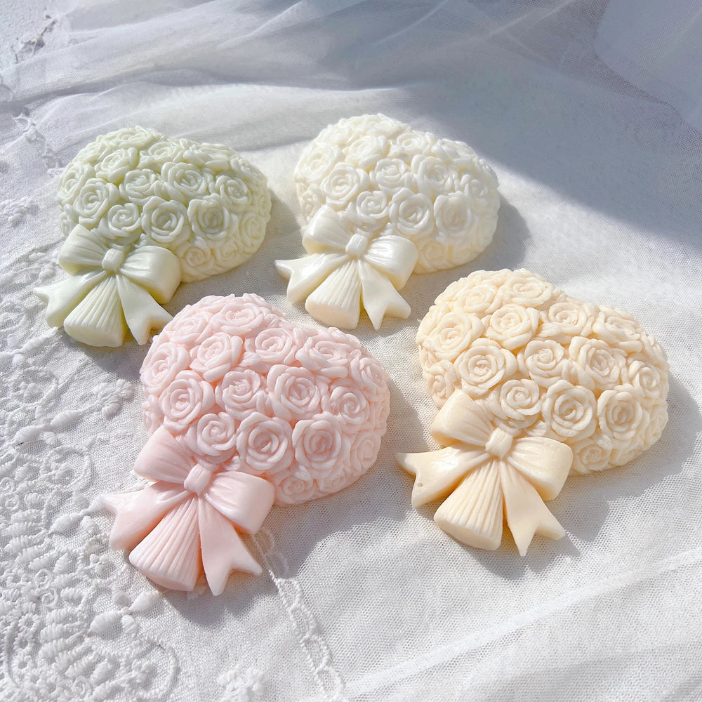 Rose bouquet castings tied with sculpted ribbon bows