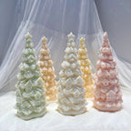 Pastel birdhouse tree candles grouped on lace