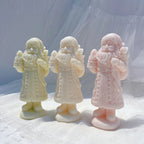 Three long-coat Santa castings on oval bases