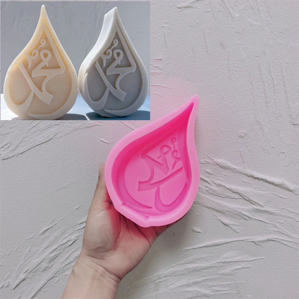 Pink silicone Teardrop Script B plaque mold with a distinct calligraphy design