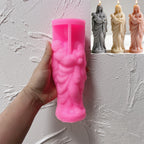 Pink silicone mother-and-baby figure mold beside finished examples