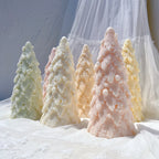 Pastel Christmas tree castings with densely layered snowy-looking branches
