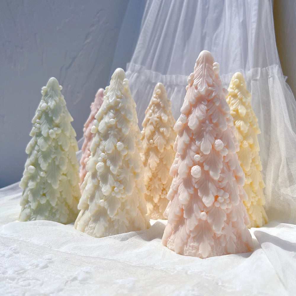 Pastel Christmas tree castings with densely layered snowy-looking branches