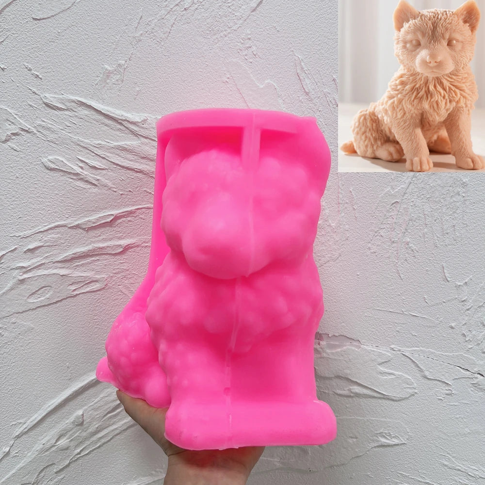 Pink wolf cub silicone candle mold held in one hand
