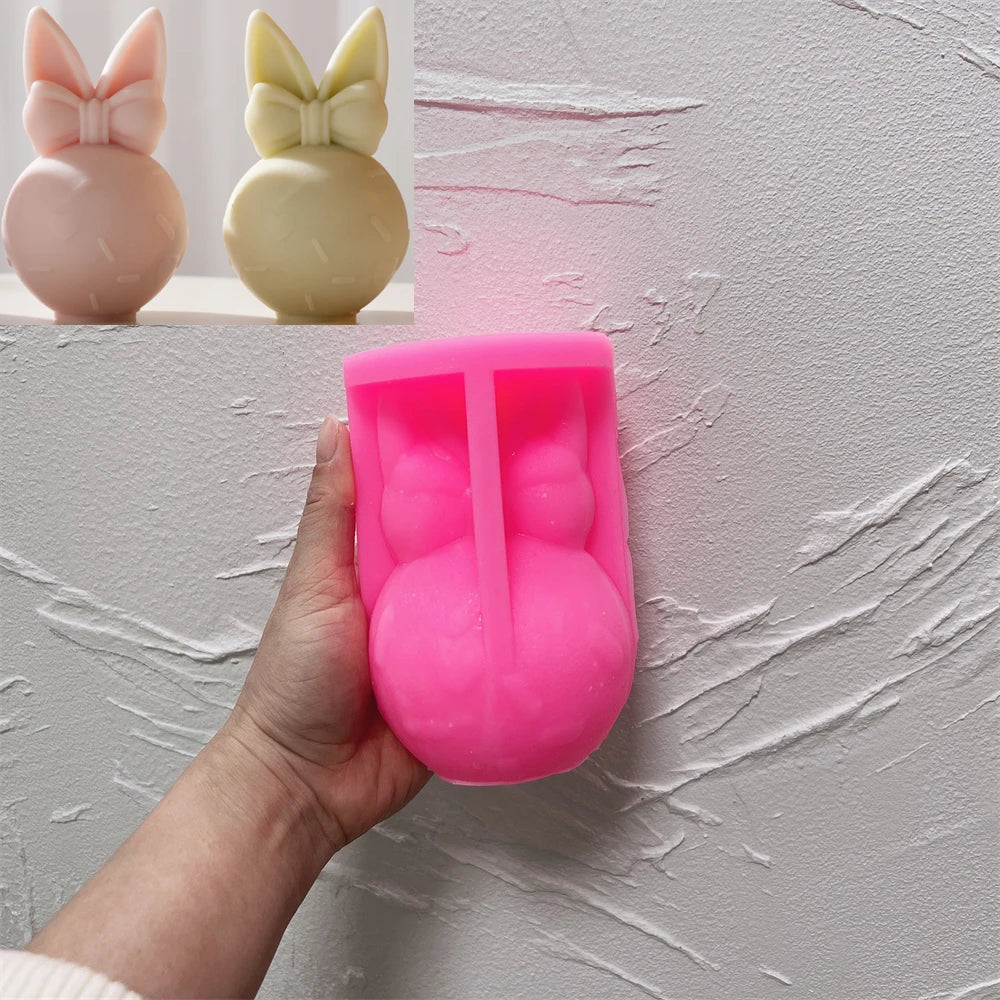 Pink silicone bow-topped bunny egg mold