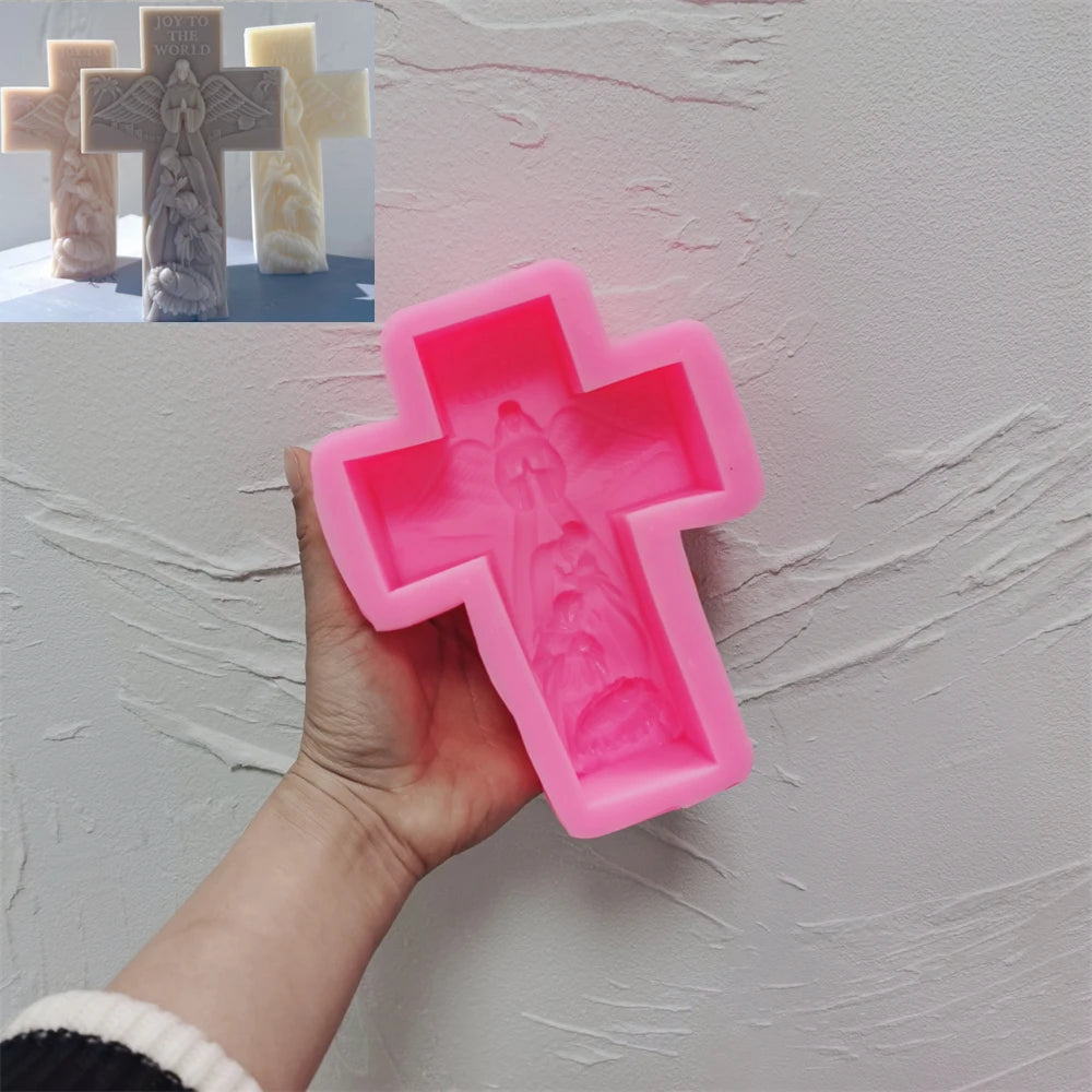 Pink silicone cross mold with angel and nativity relief cavity