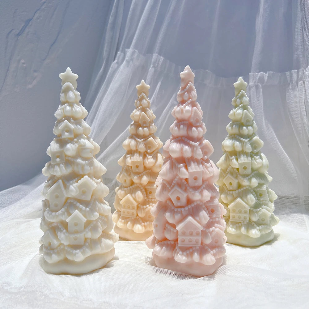 Birdhouse-decorated tree castings in cream peach pink and green