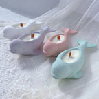 Rounded beluga forms with sculpted fins and smooth curved bodies