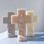 Cross castings with winged angels and nativity scenes