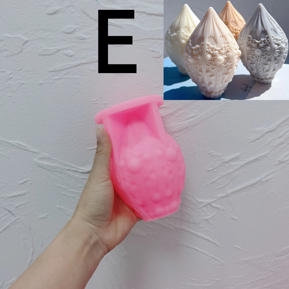 Pink silicone Floral Teardrop E mold held in a hand
