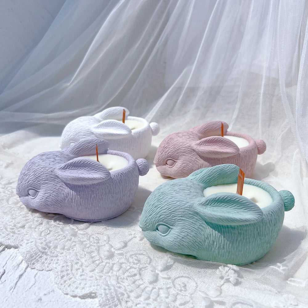 Pastel resting rabbit vessels with back openings and folded ears