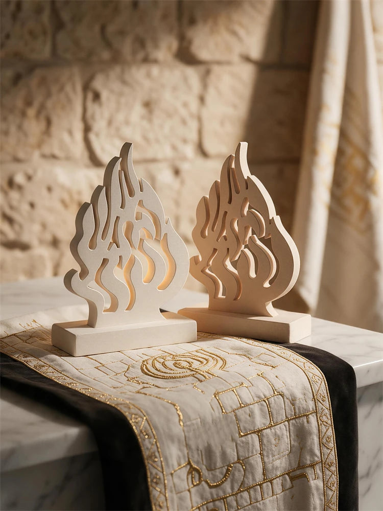 Cream and peach flame ornaments mounted on rectangular bases
