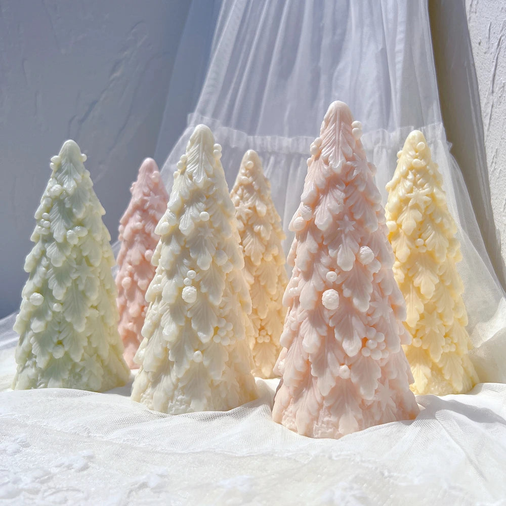 Textured green, cream and pink Christmas tree samples on fabric
