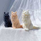 Black, peach and cream seated cat examples