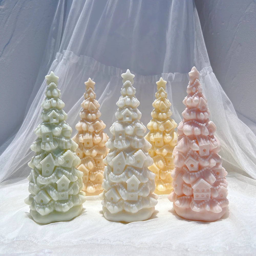 Star-topped Christmas trees with tiny birdhouses and rounded ornaments