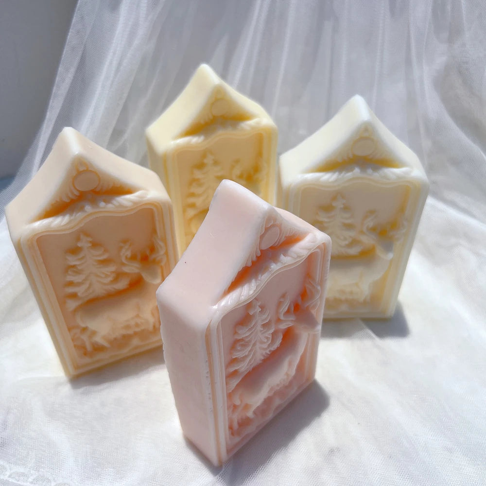 Overhead view of house-shaped plaques and raised scenes