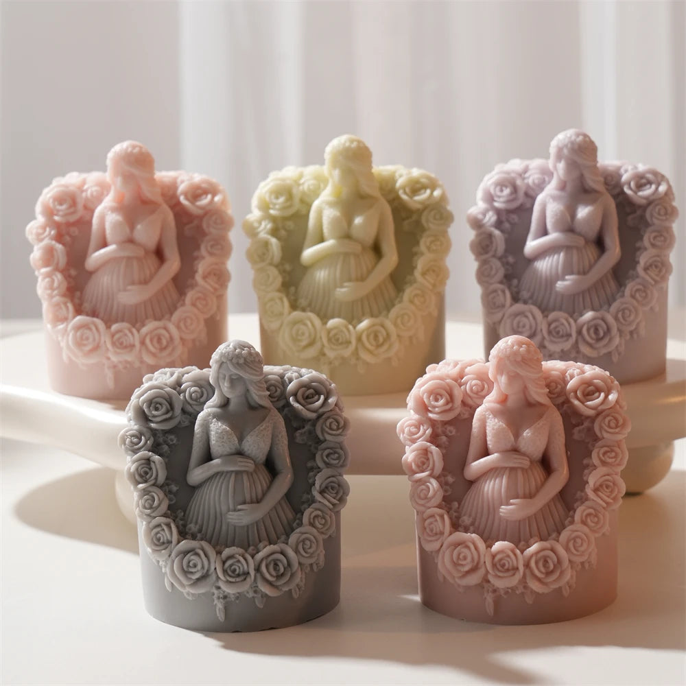 Pregnancy figure candles with floral borders in assorted colors