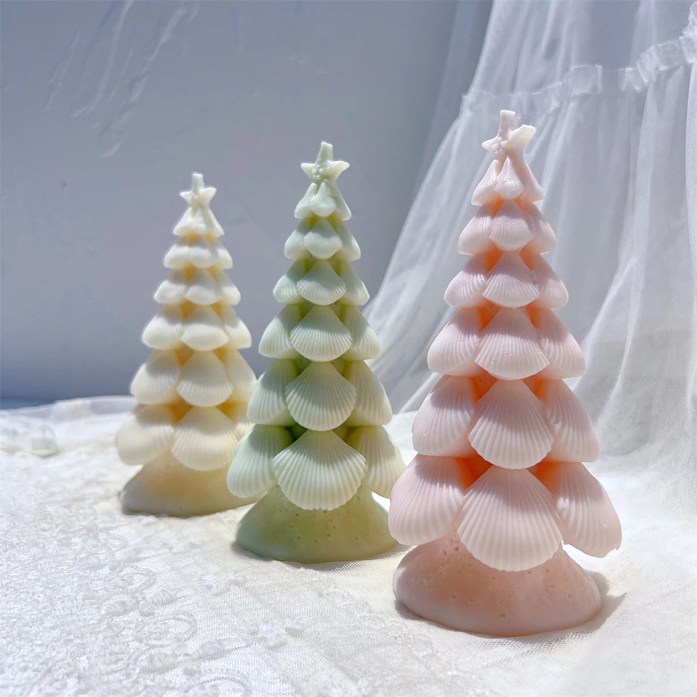 Cream green and peach ribbed tree castings on a lace surface