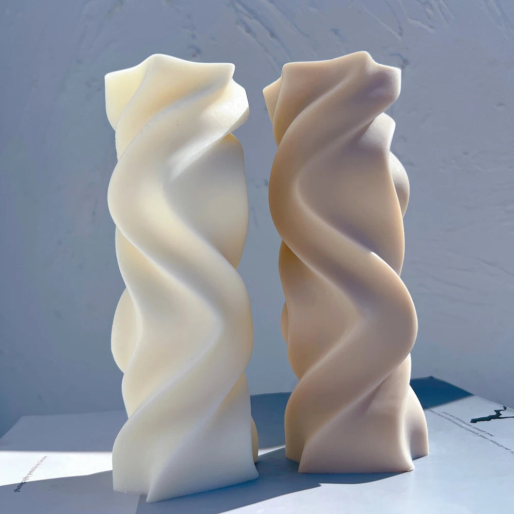 Cream and gray smooth wave castings on a blue surface