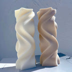 Cream and gray smooth wave castings on a blue surface