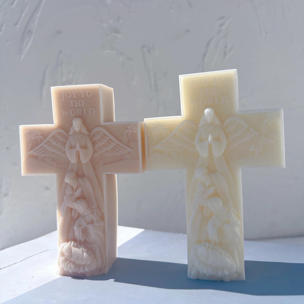 Pale cross castings with nativity figures along the stems