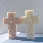 Pale cross castings with nativity figures along the stems