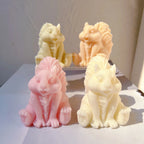 Sitting squirrel candle figures with sculpted tails and expressive faces