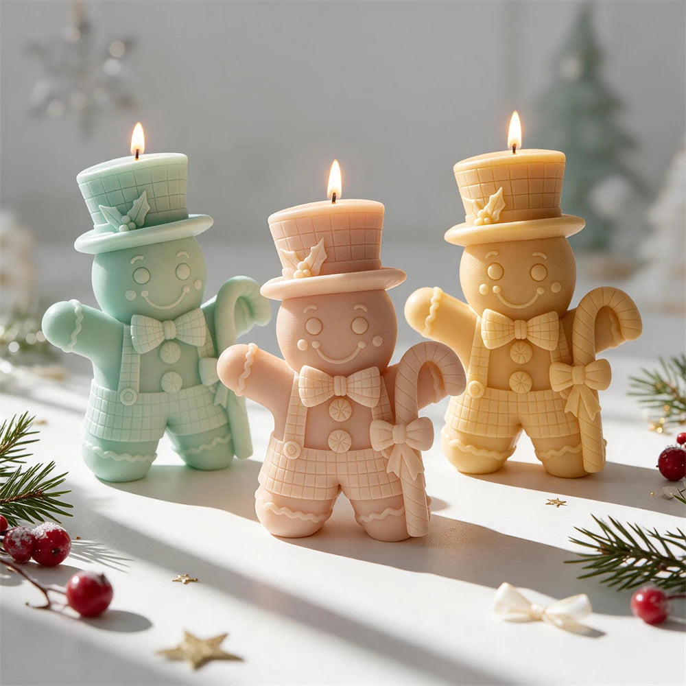 Three smiling gingerbread characters with bow ties