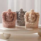 Rose-framed pregnancy figure candles on a display tray