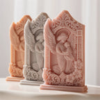 Angled mother-and-baby relief castings with raised frame detail