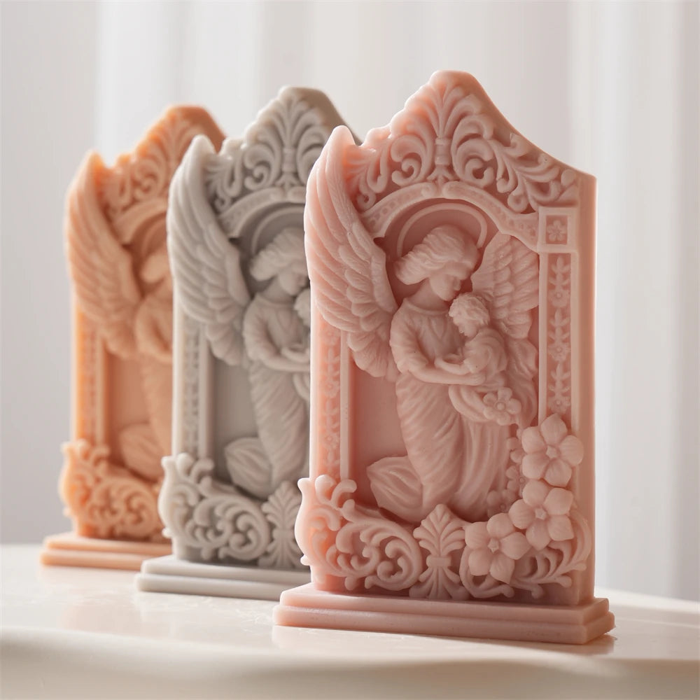 Angled mother-and-baby relief castings with raised frame detail