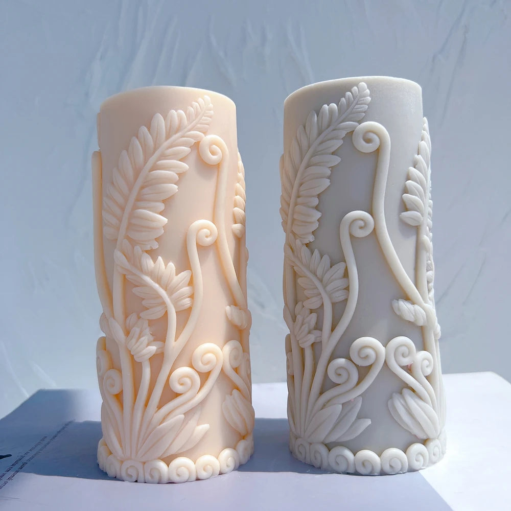 Peach and gray botanical pillars with raised leaf relief