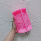 Pink silicone egg cottage mold showing window and door cavities
