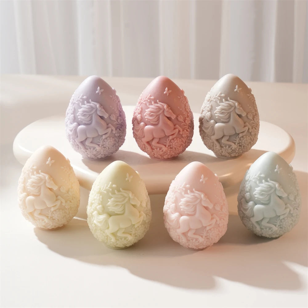 Large Easter egg castings with flowing horse relief in pastel colors