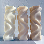 Three smooth wave twist pillar castings with broad flowing ridges