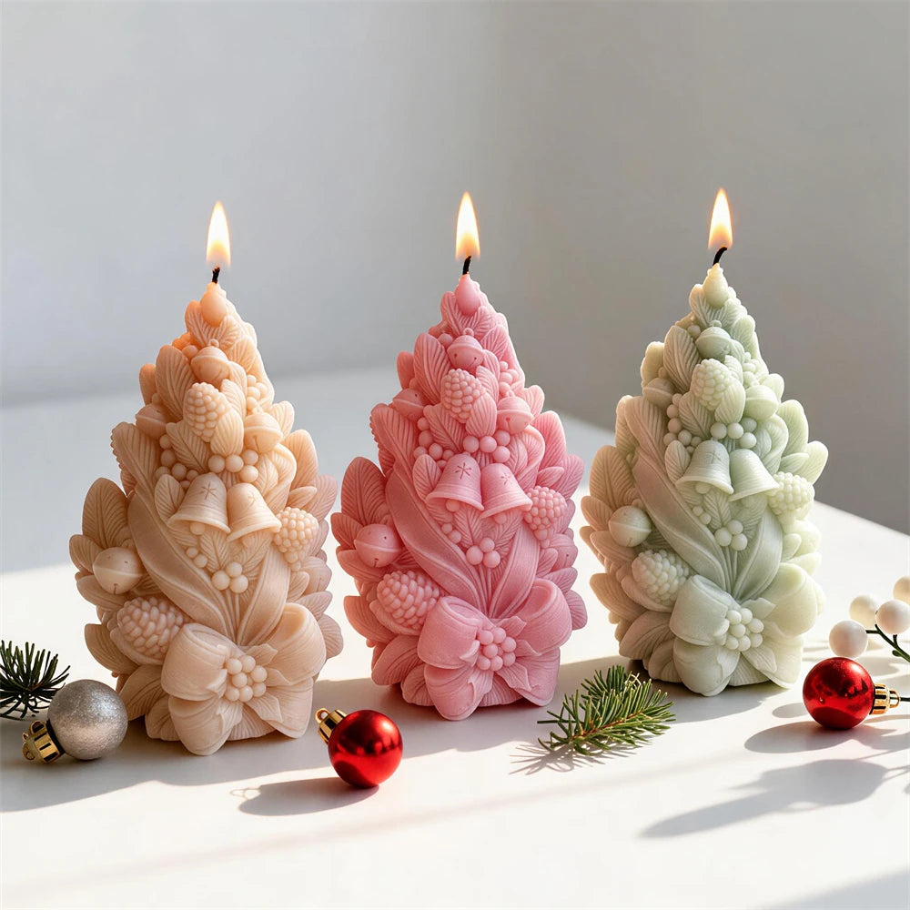 Peach, pink and green pinecone candles decorated with bells and bows