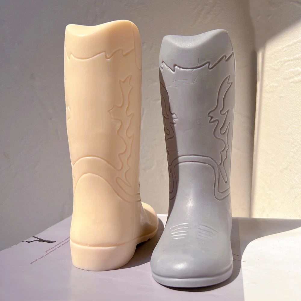 Front view of tall embossed cowboy boot castings